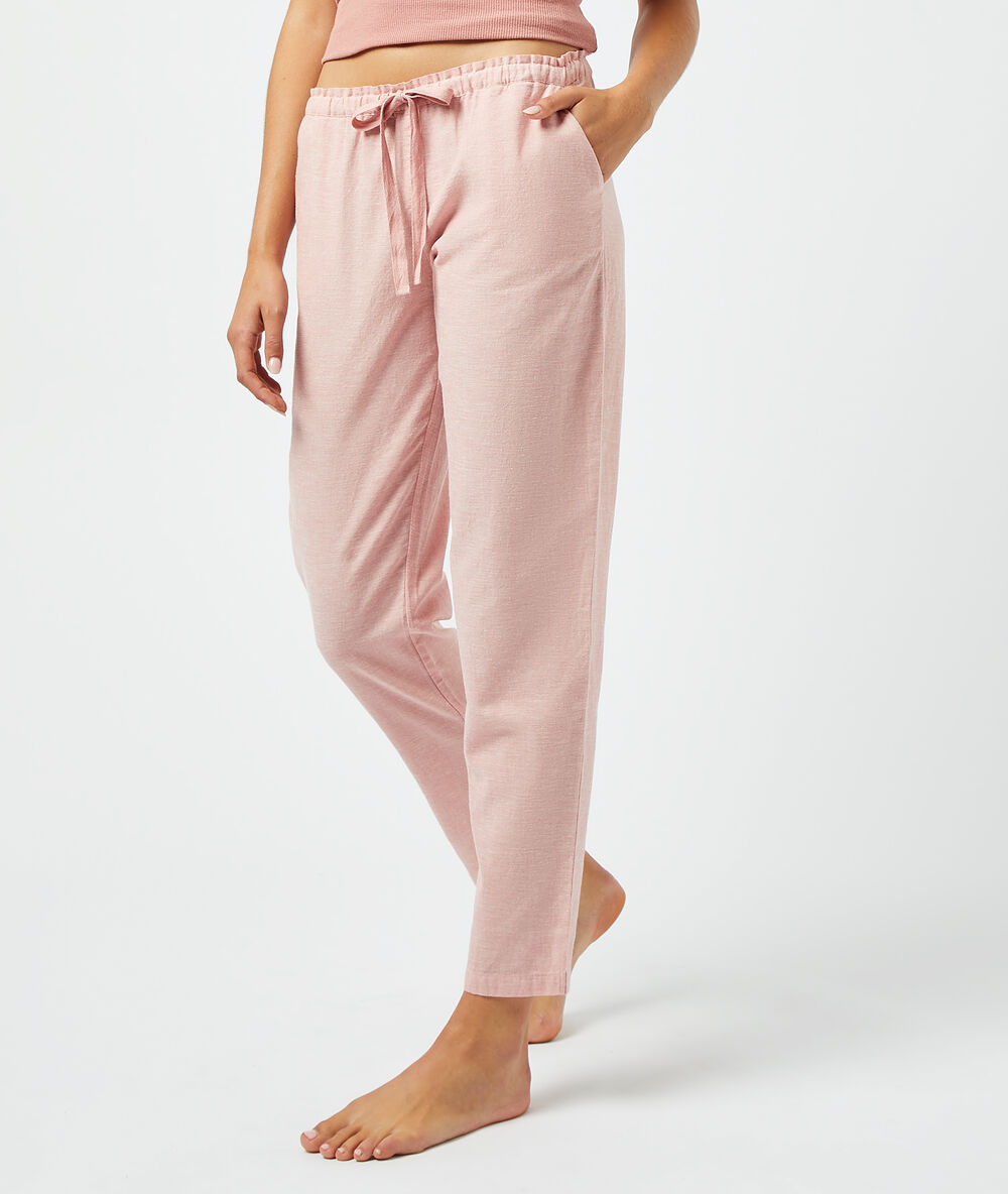 Pantalón anudado cintura rosa.