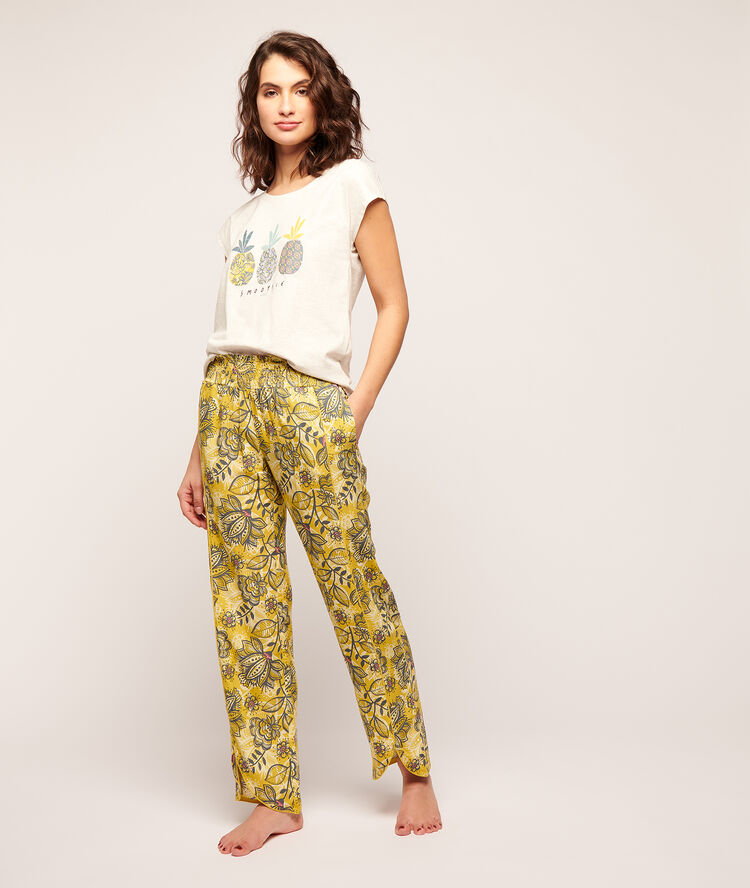 Pantalón largo estampado floral amarillo.