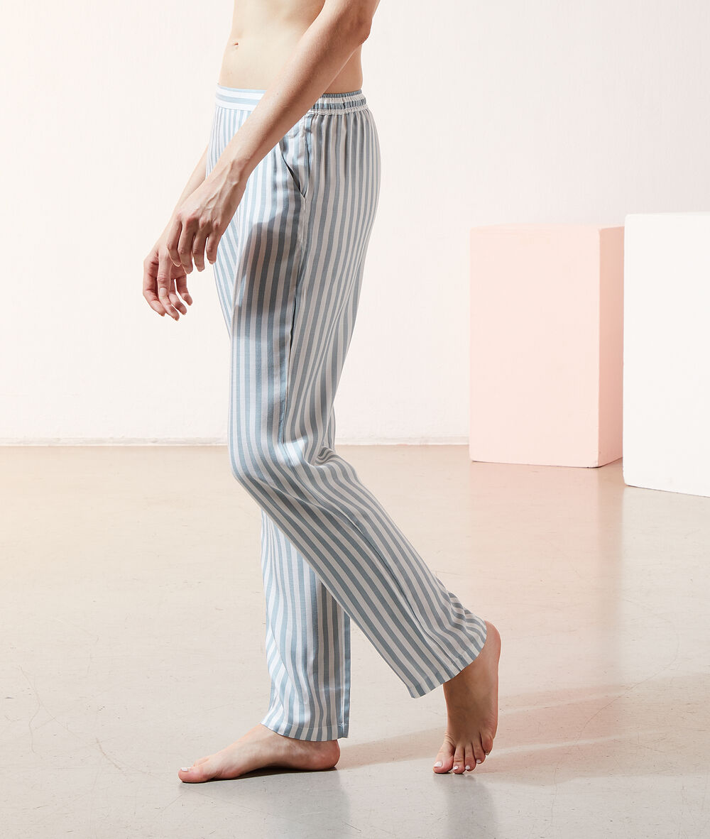 Pantalon à rayures imp fond vert.