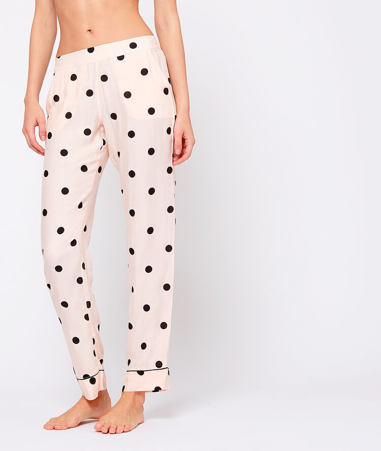 Pantalón pijama estampado de lunares rosa.