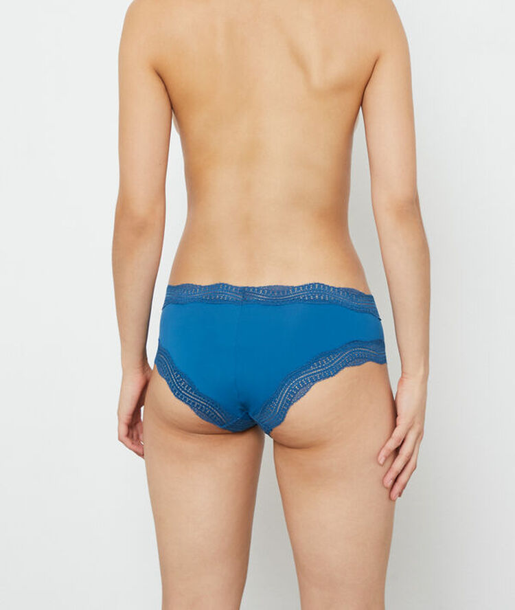 Culote con motivos de encaje azul.