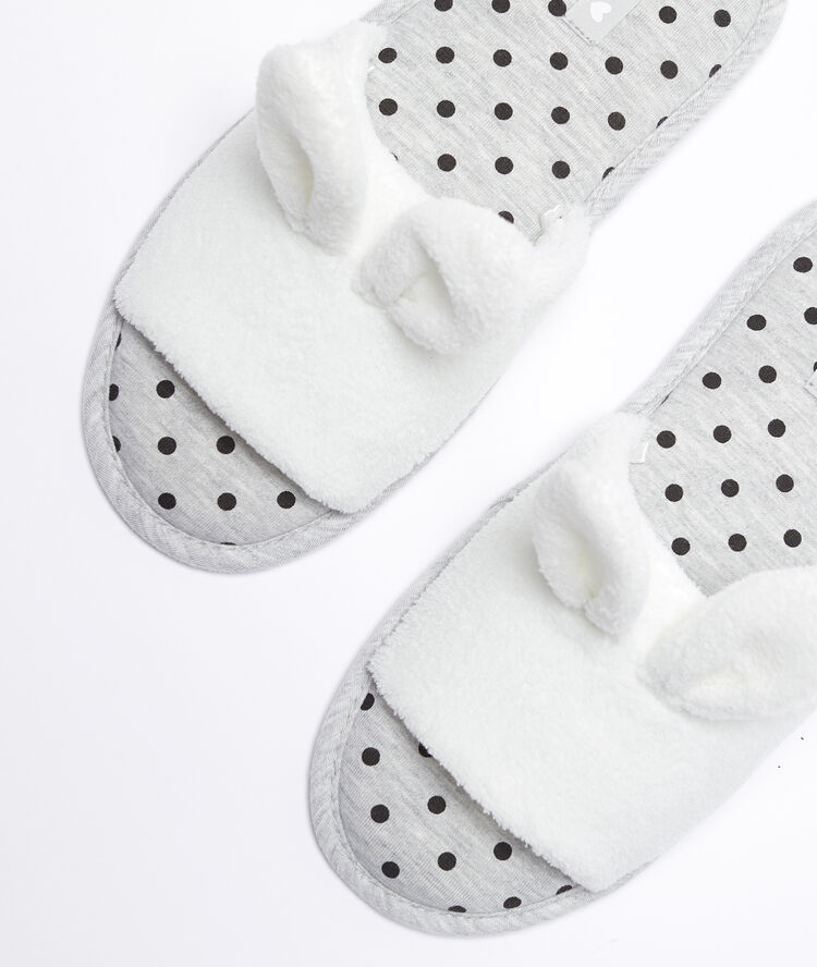Zapatillas orejas conejito crudo.