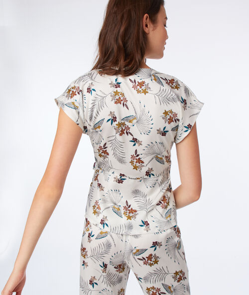 Top escote cruzado estampado floral crudo.
