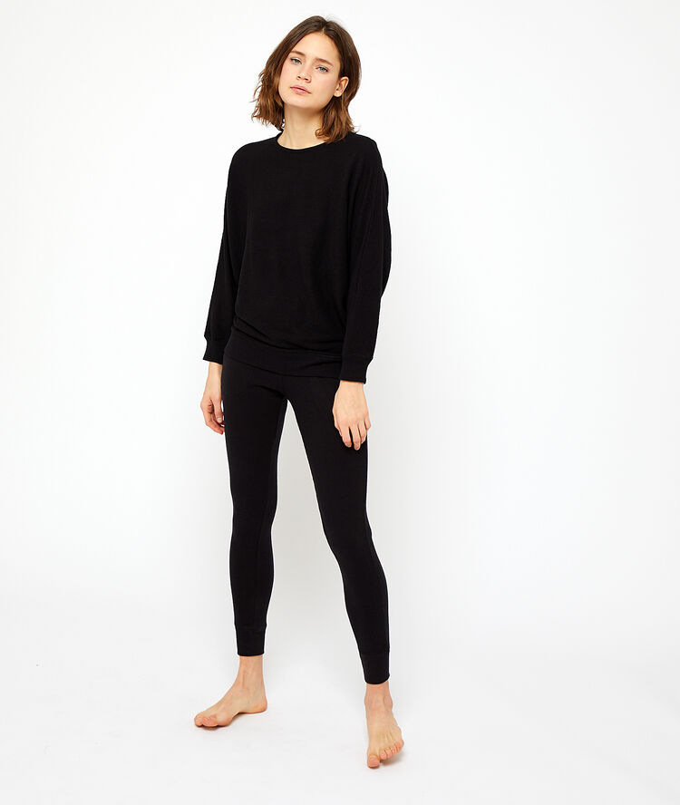 Pantalón tejido canalé negro.