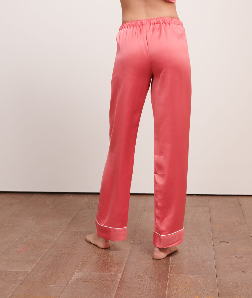 Pantalón pijama de satén coral.