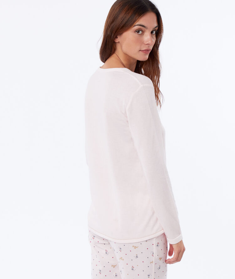Camiseta manga larga motivos navideños rosa.
