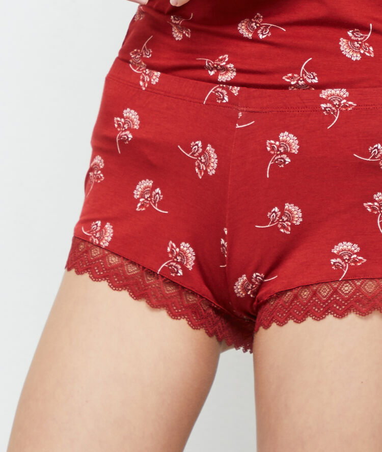 Pantalón corto estampado floral rojo teja.