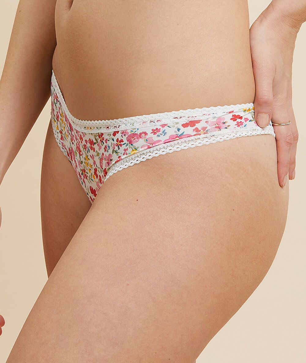Tanga estampado floral crudo.