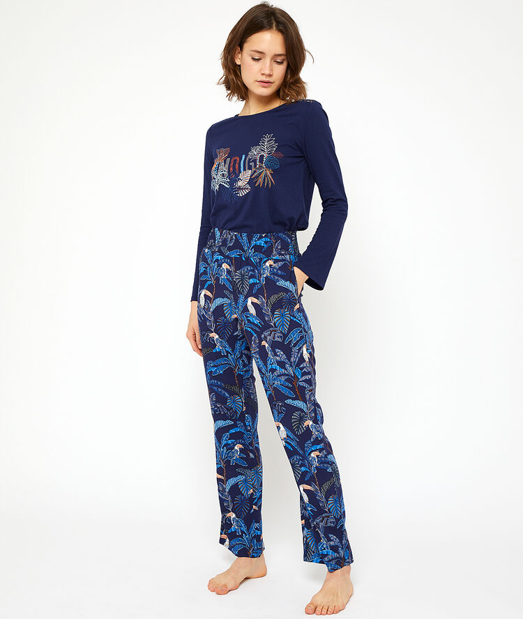 Pantalón estampado tropical azul marino.