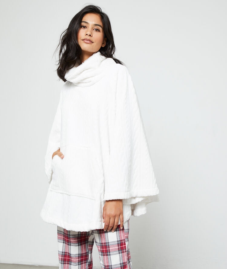 Poncho tejido doble crudo.