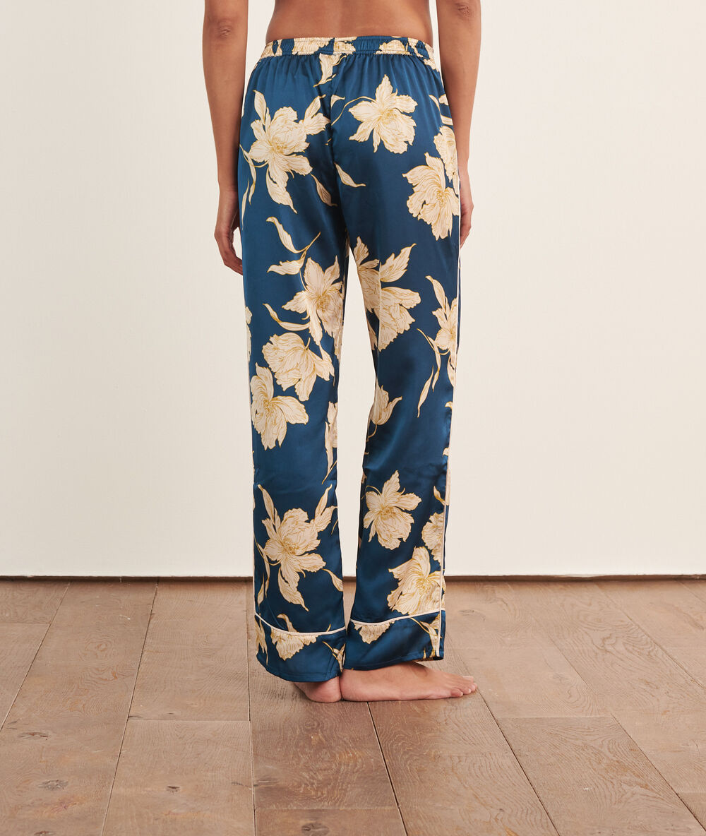 Pantalon imprimé bleu petrole.