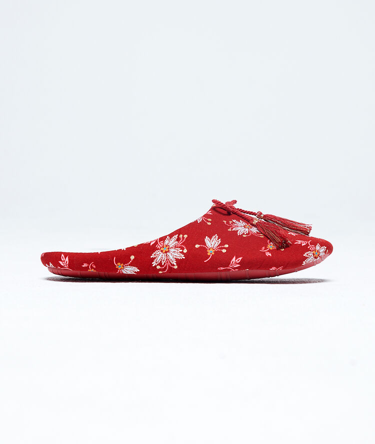Zapatillas destalonadas estampadas multicolor.