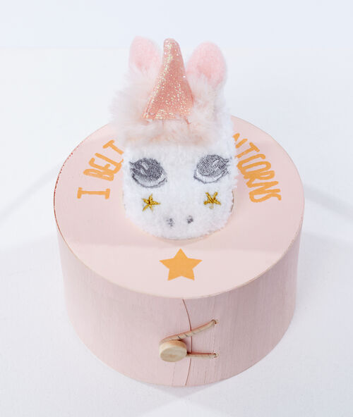 Caja con calcetines unicornio rosa.