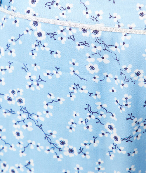 Pantalón estampado pequeñas flores azul cielo.
