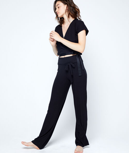 Pantalón de canalé anudado en la cintura negro.