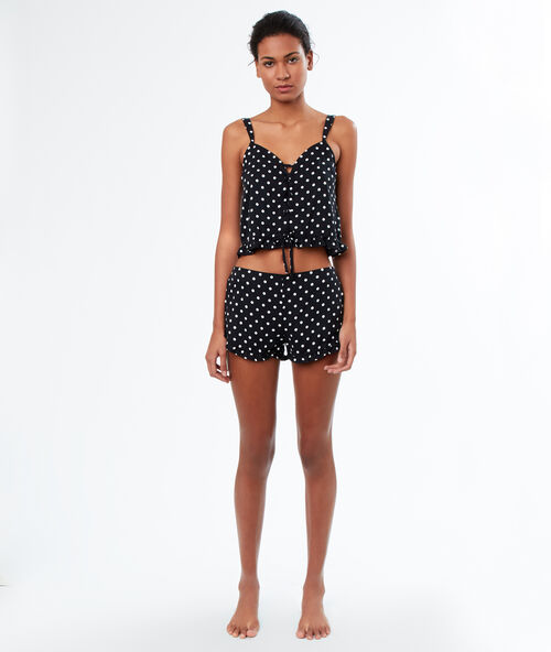 Top estampado de lunares negro.