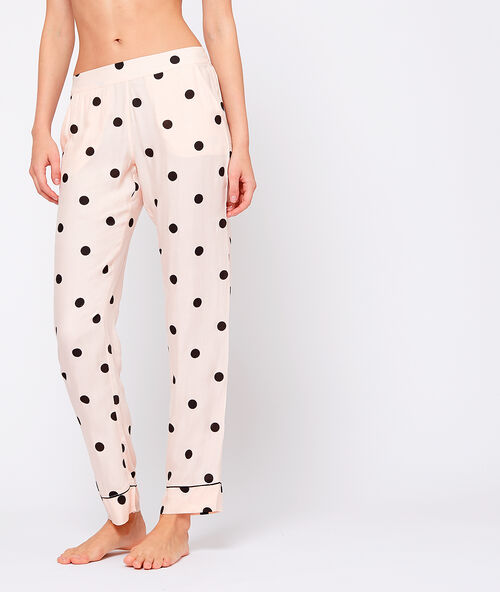 Pantalón pijama estampado de lunares rosa.