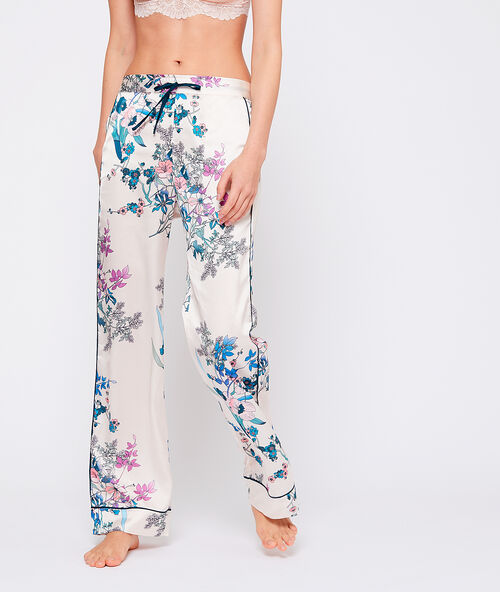 Pantal&oacute;n de sat&eacute;n estampado floral crudo.