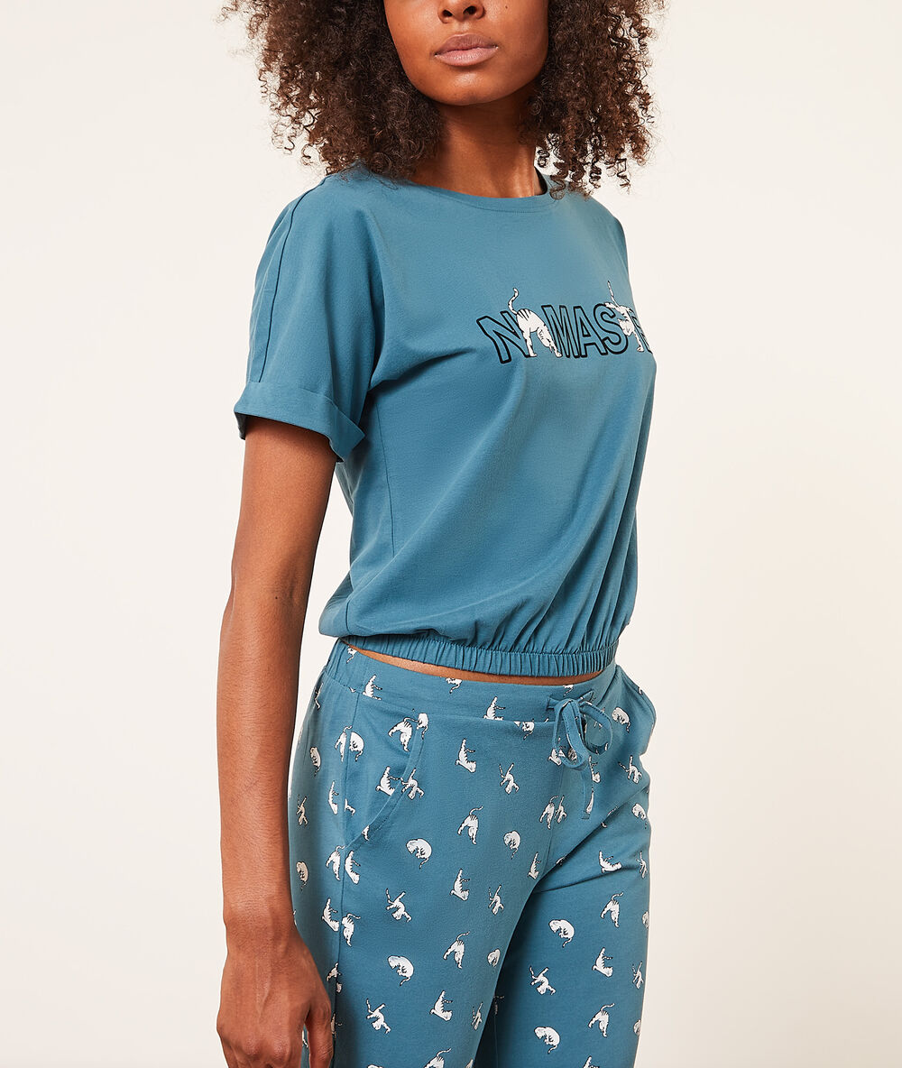 Camiseta manga corta 'namaste' turquesa.