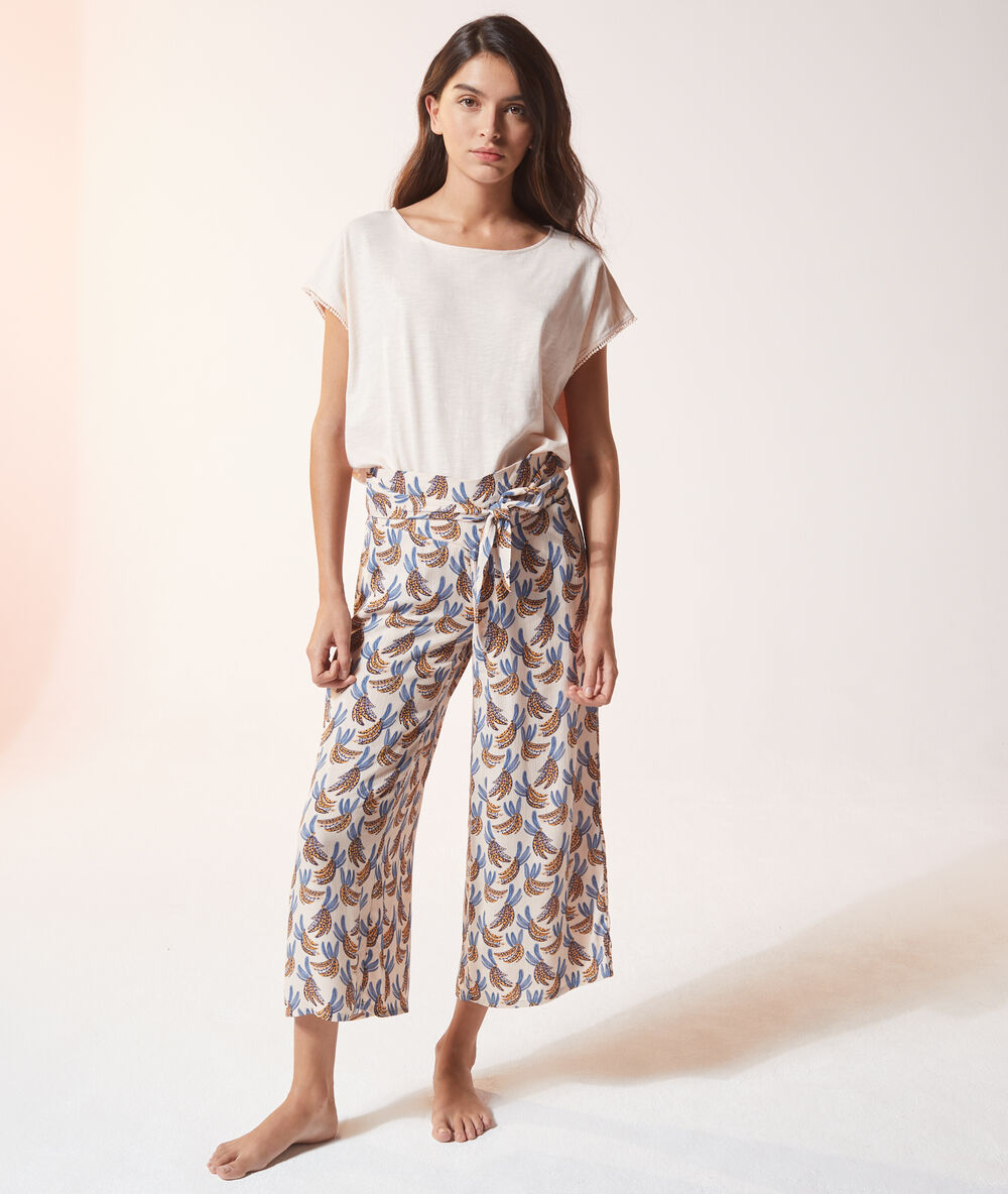 Pantalón 7/8 estampado tropical rosa.