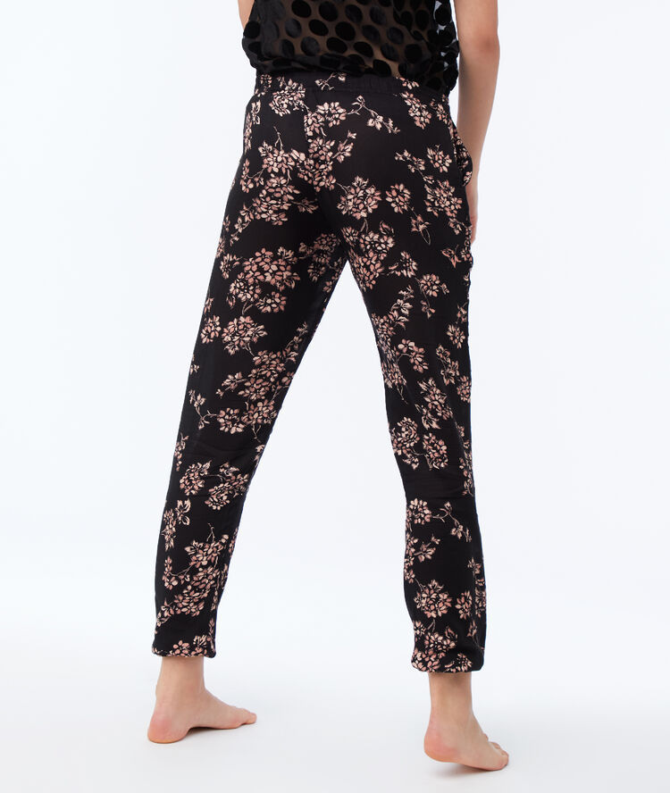 Pantalón largo estampado floral negro.