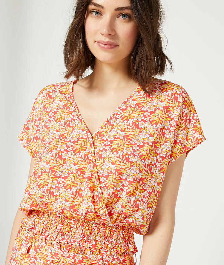 Top estampado floral coral.