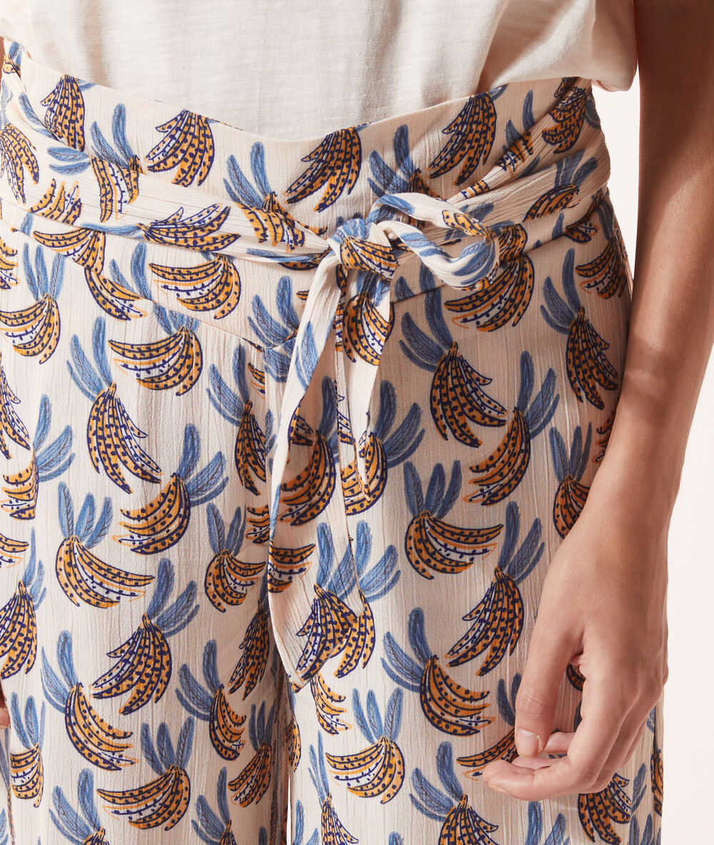 Pantalón 7/8 estampado tropical rosa.