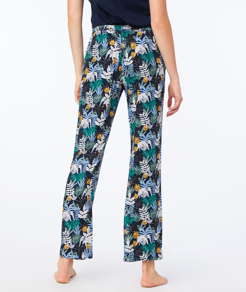 Pantalón estampado tropical azul marino.
