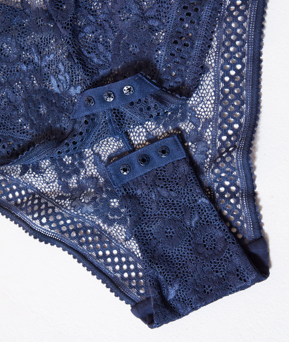 Body de encaje floral azul marino.