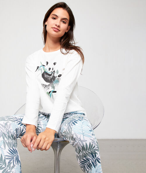 Pantalón estampado de hojas crudo.