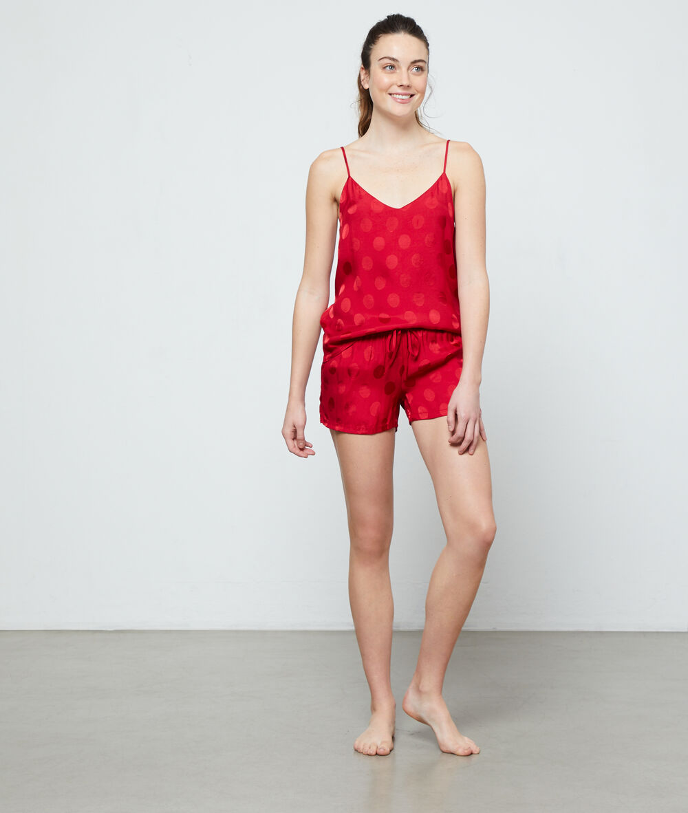 Top satén estampado lunares rojo.