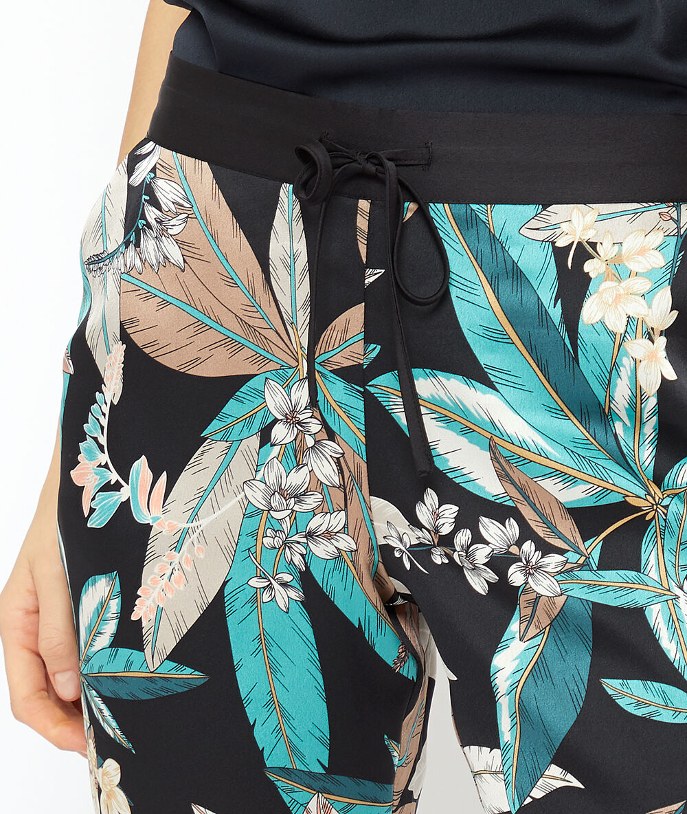 Pantalón pijama estampado tropical negro.