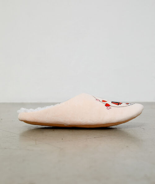 Zapatillas destalonadas con forro snoppy rosa.