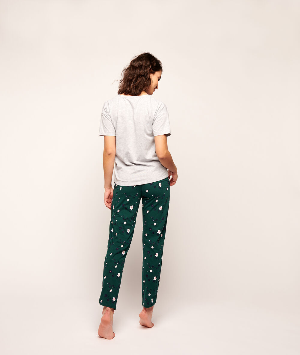 Pantalón estampado floral verde oscuro.