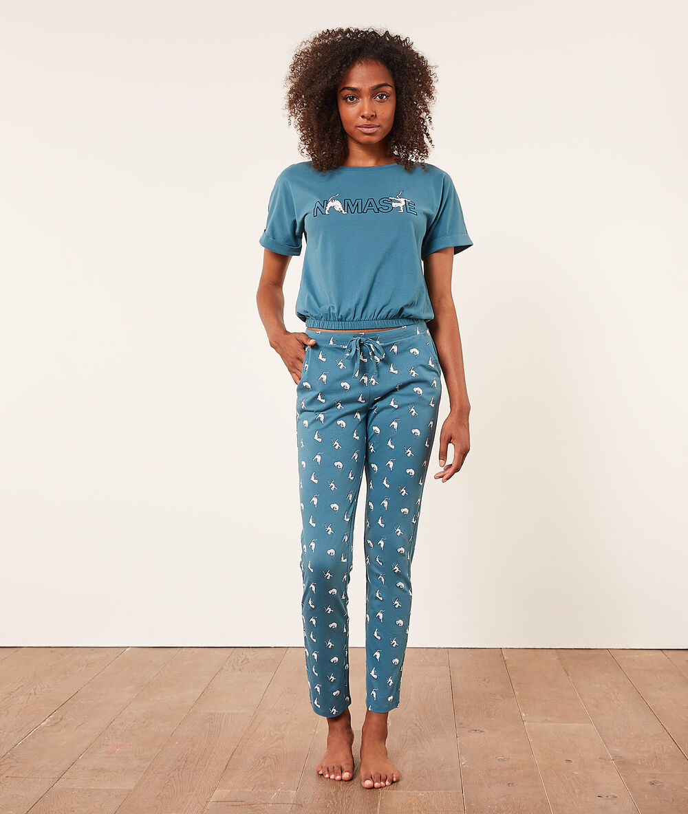 Pantalón pijama estampado gatos turquesa.