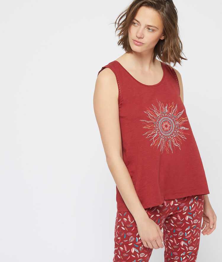 Top sin mangas con estampado sol rojo.