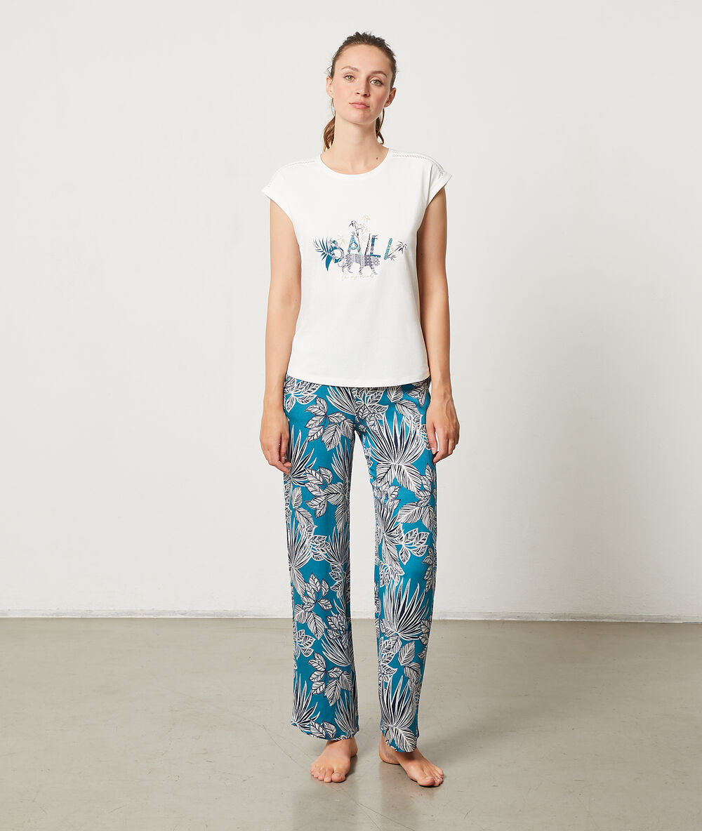 Pantalón estampado tropical turquesa.