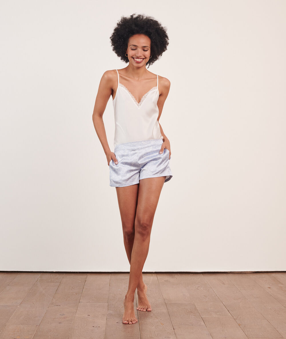 Pantalón de satén estampado azul.