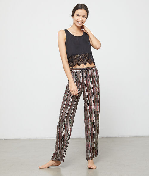 Pantalón holgado estampado negro.