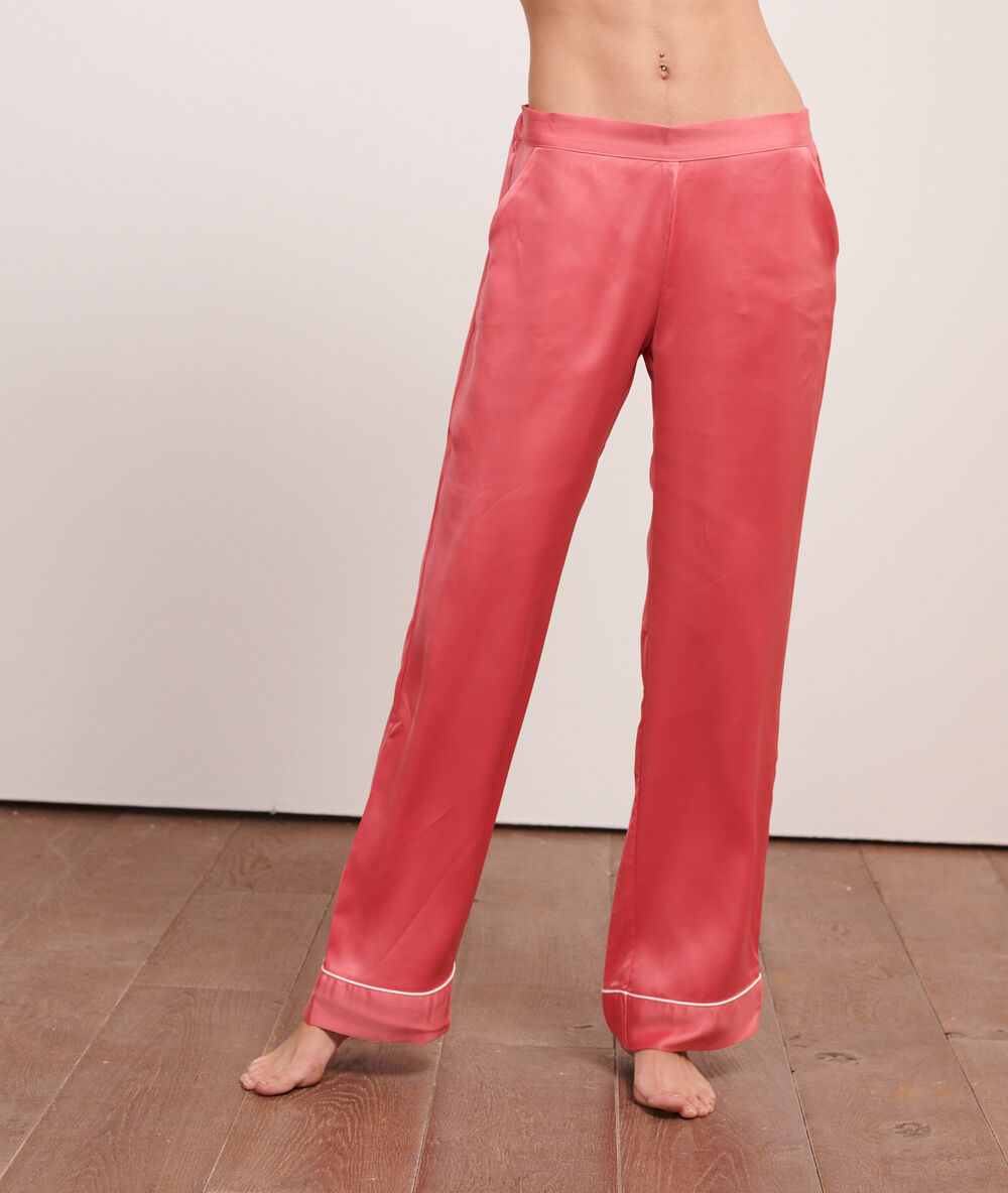 Pantalón pijama de satén coral.