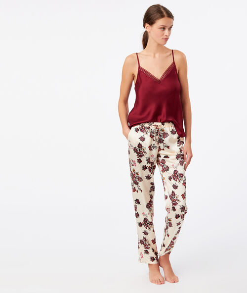 Pantalón de satén estampado floral crudo.