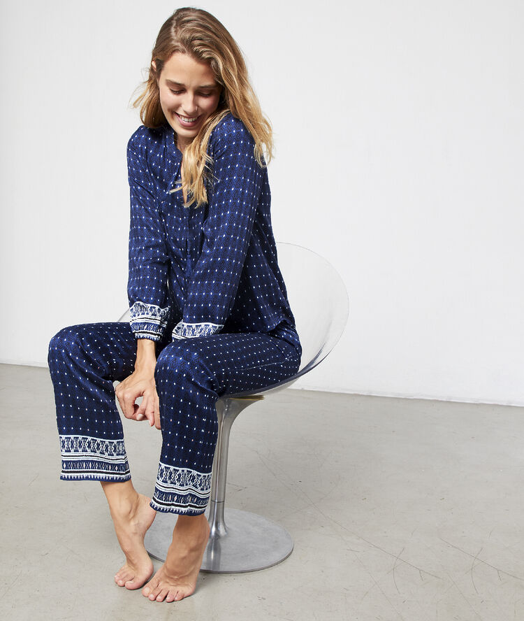 Pantalón de satén estampado azul marino.