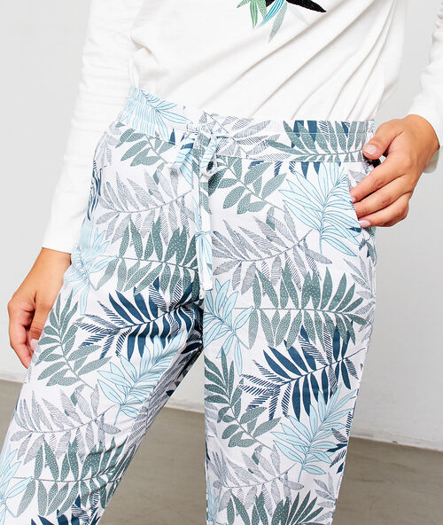 Pantalón estampado de hojas crudo.