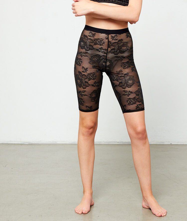 Leggings de encaje floral negro.