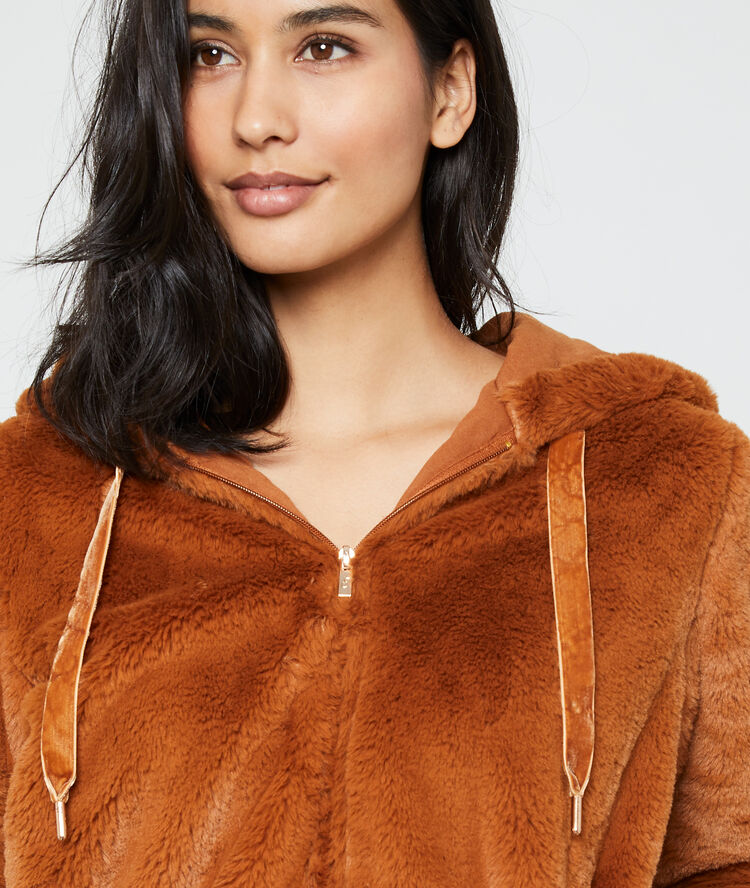 Chaqueta tejido peluche terracota.