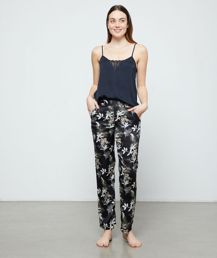 Pantalón de satén estampado hojas negro.