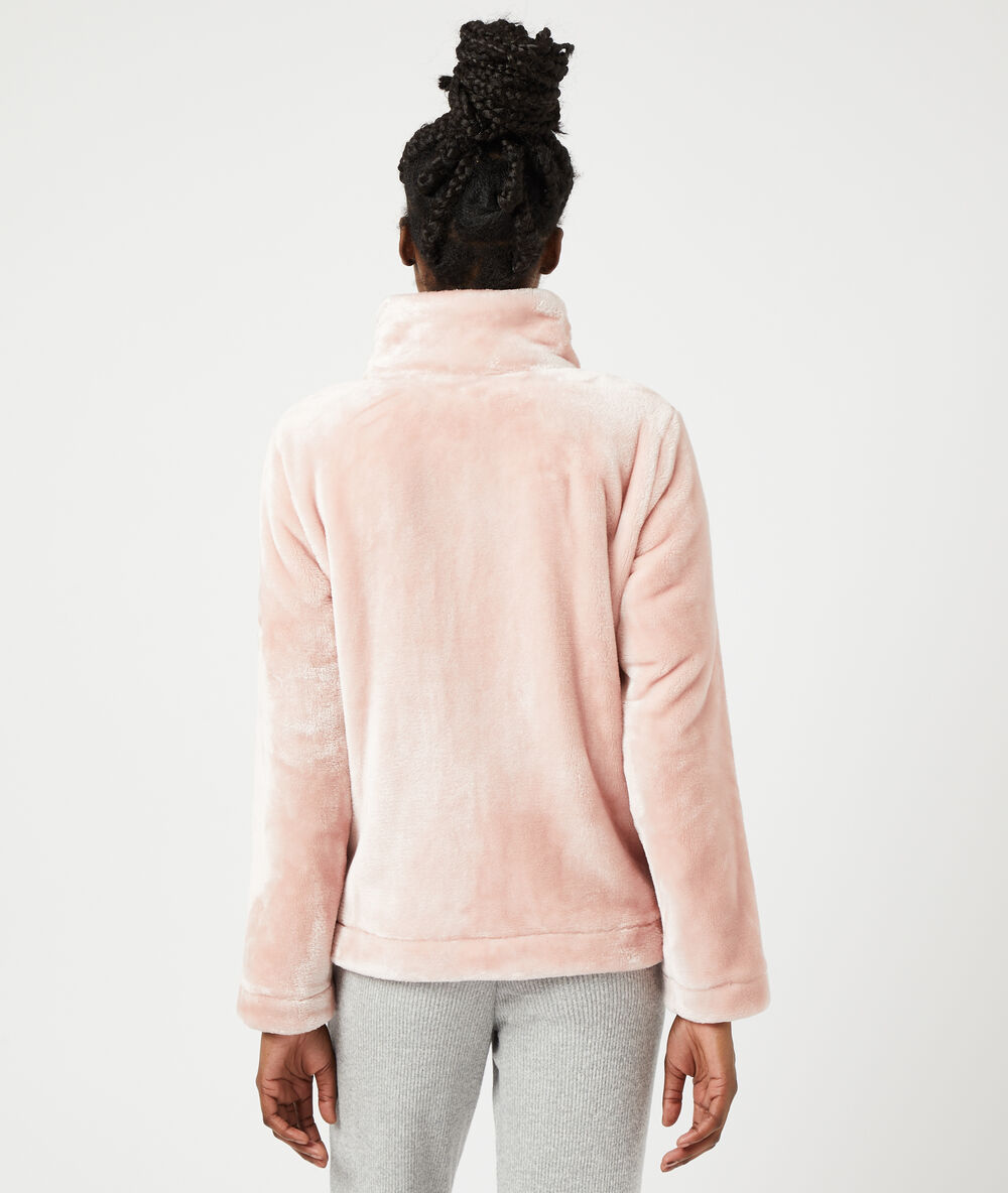 Chaqueta tejido peluche rosa.