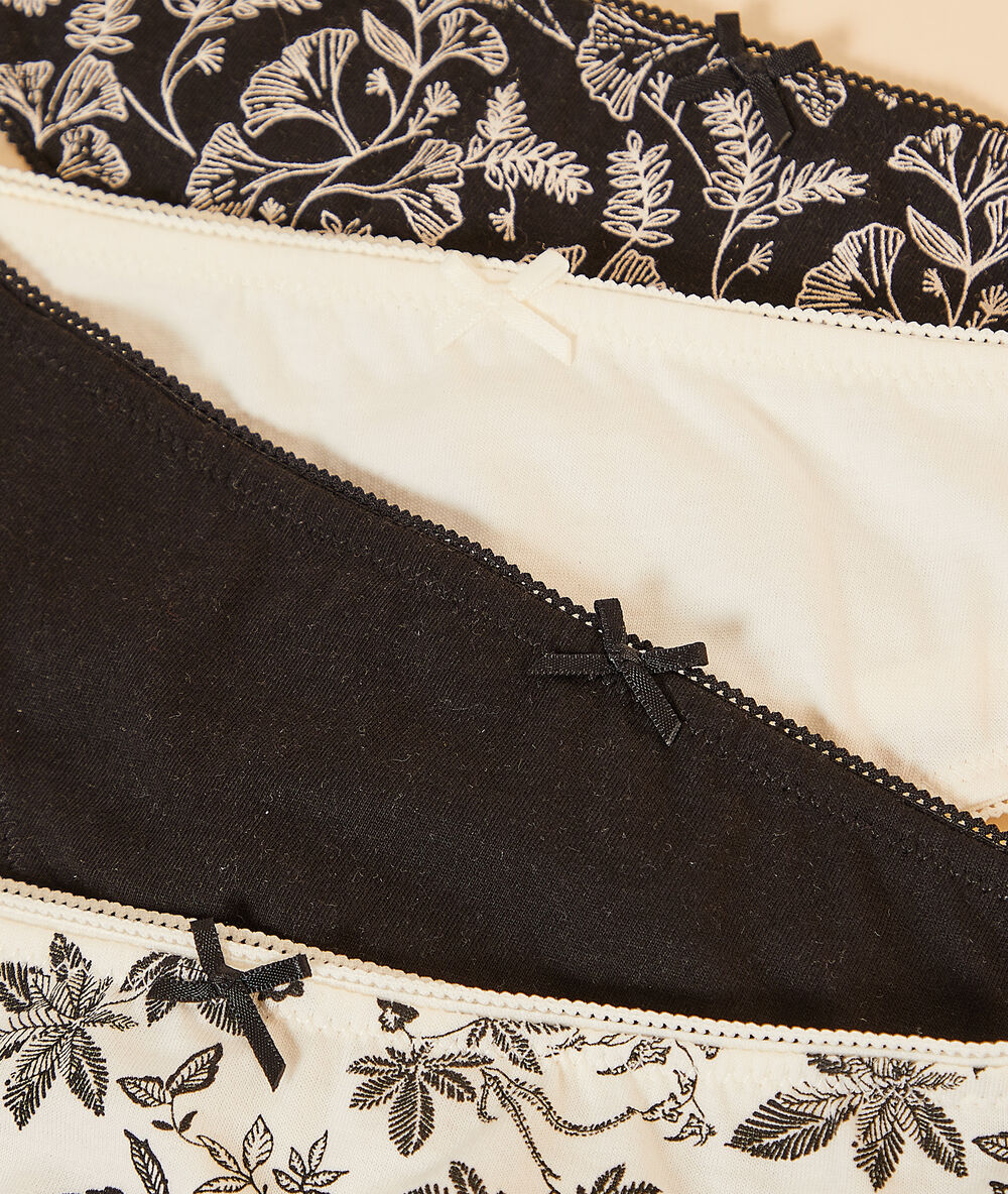 Lote de 4 tangas estampados negro.