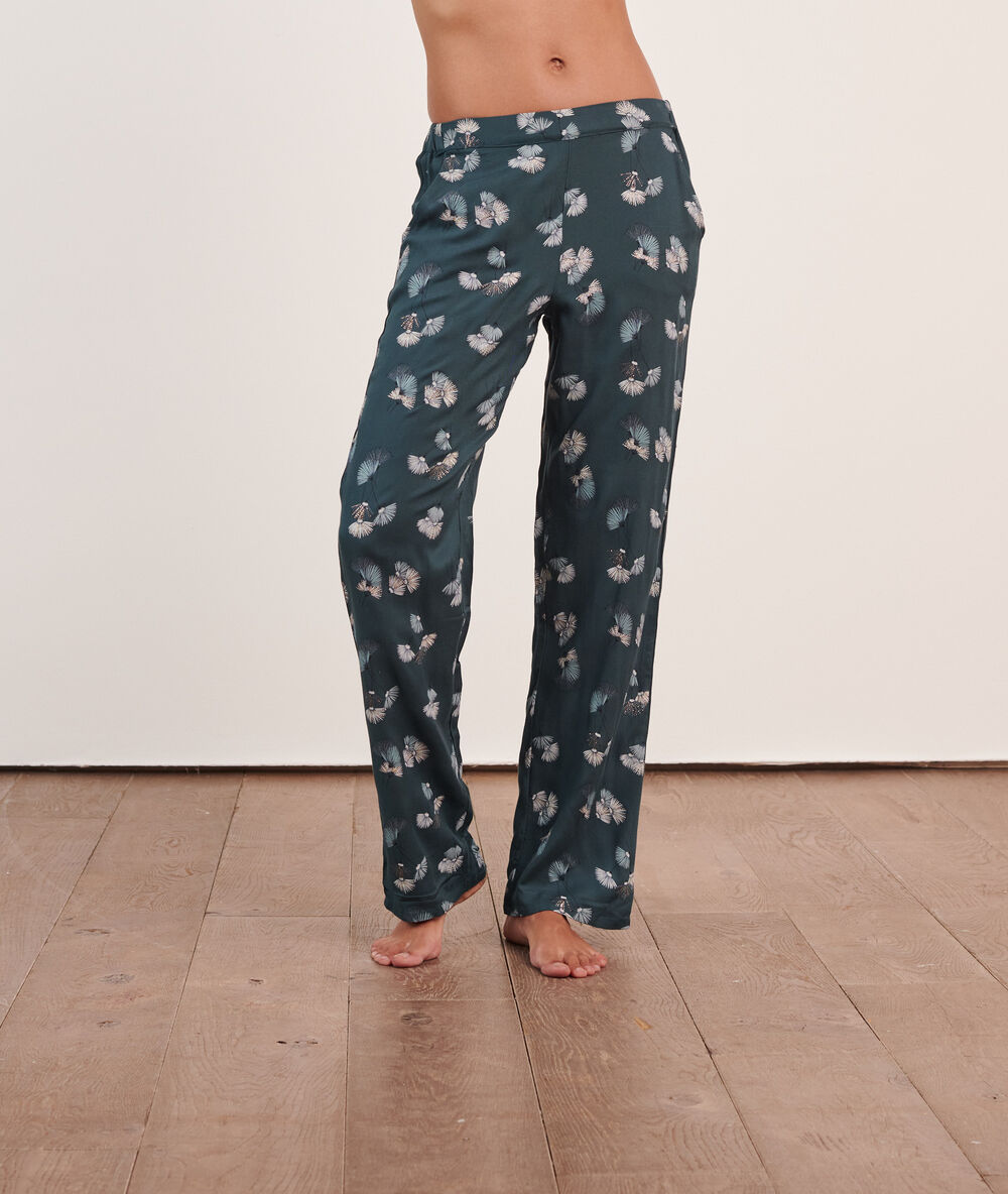 Pantalon imprimé vert.