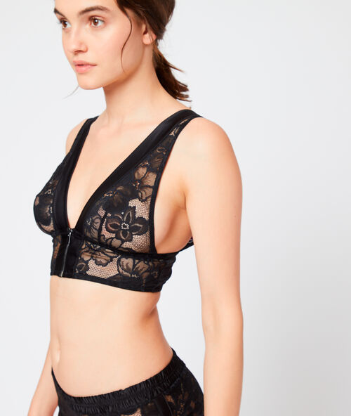 Bralette de encaje floral cierre cremallera negro.